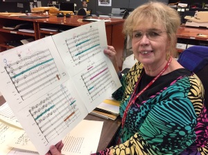 Mary Judge, CSO librarian, with Erich Kunzel's score to Fanfare for the Common Man